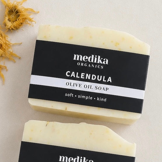Organic Calendula Olive Oil Soap with dried calendula flowers.