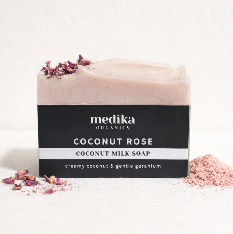 A handmade natural soap bar coloured with pink clay and scented with rose geranium essential oil. Small batch made in Australia.