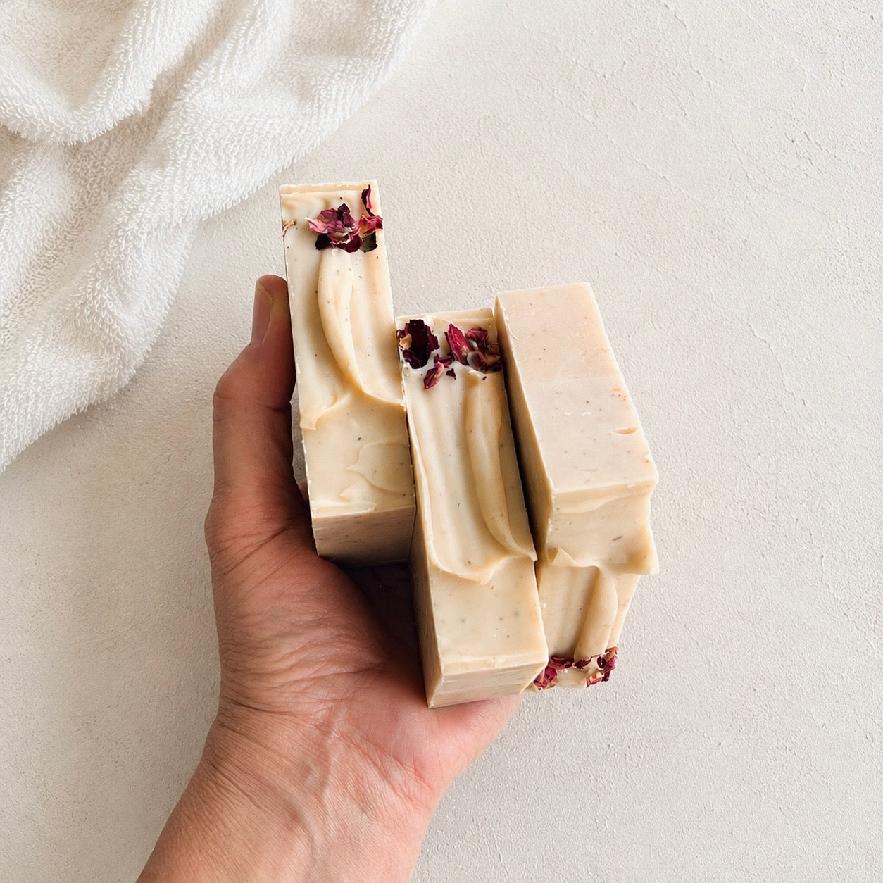 Rose clay soap with pink clay and natural rose petals.